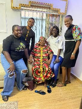 PCSS caregivers with an elderly client and her family
